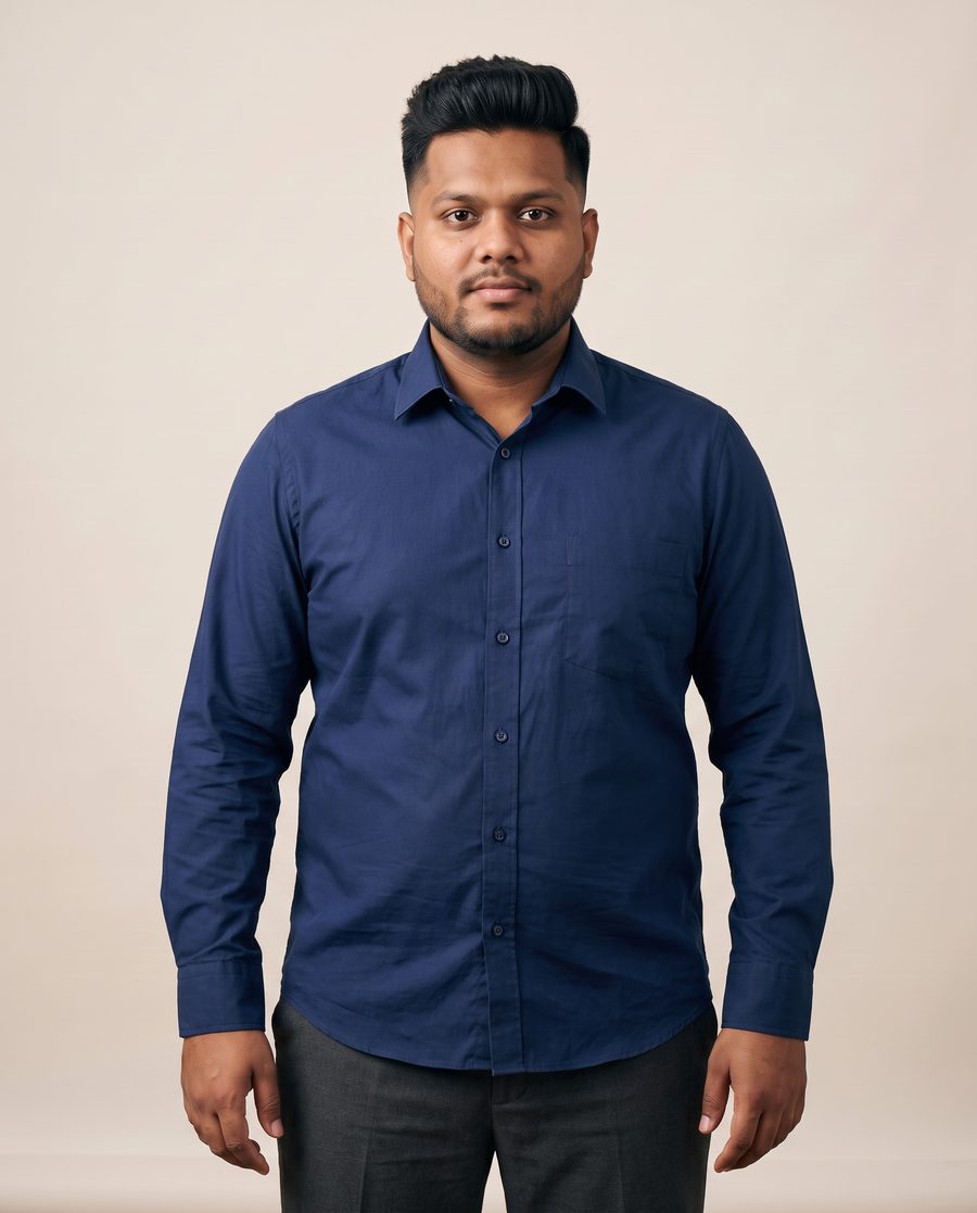 The same man with height on top, a squared beard line and a deep blue shirt